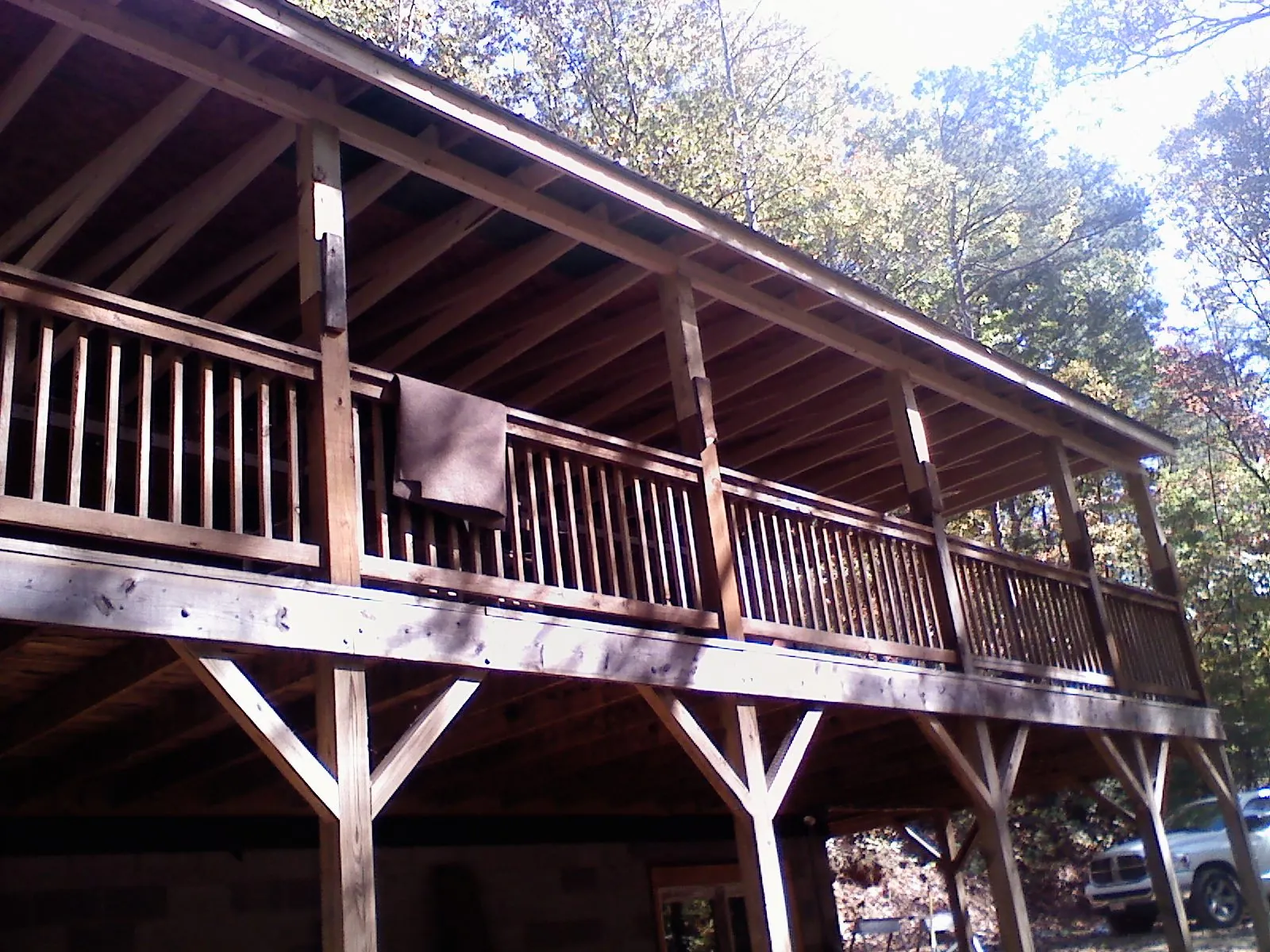 Timber framing under a new elevated porch and deck — Roof Leak Repair in West Jordan by Roofing Brothers